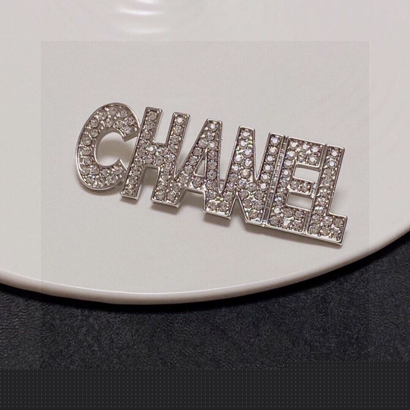 Ch*el brooches